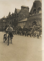 Boy with Pipers outside New Picture House 